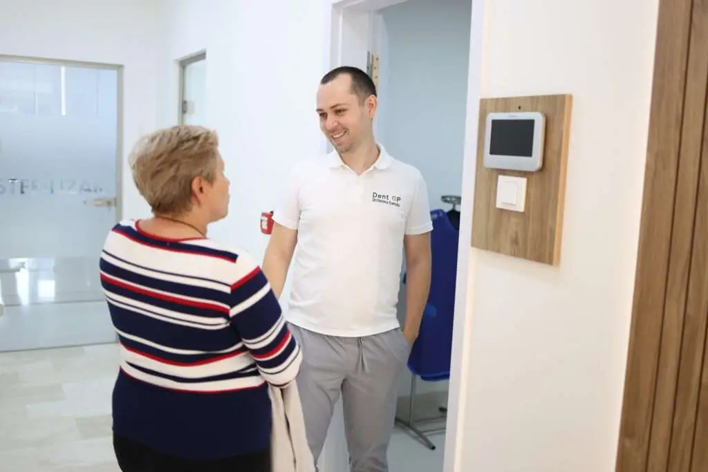Dr. Corrado Cazacu with Patient - ZAGA Center Bucharest