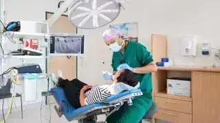 Catharina hospital - Professional team working with a dental patient