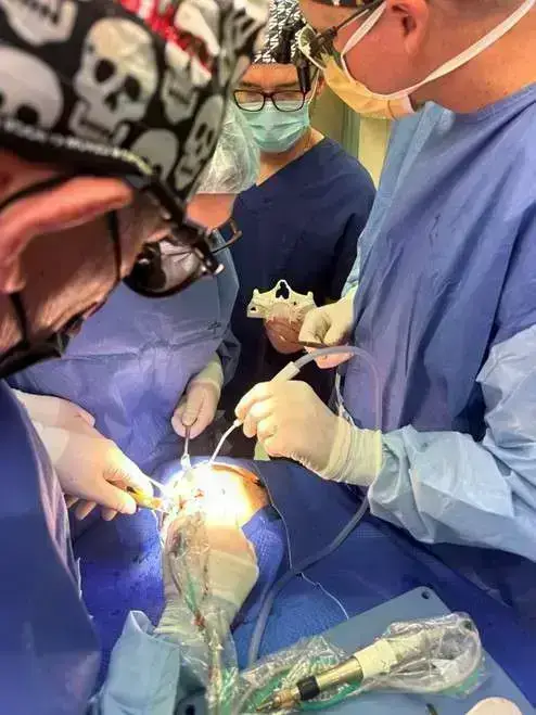Performing surgery on a patient - ZAGA Center Adelaide